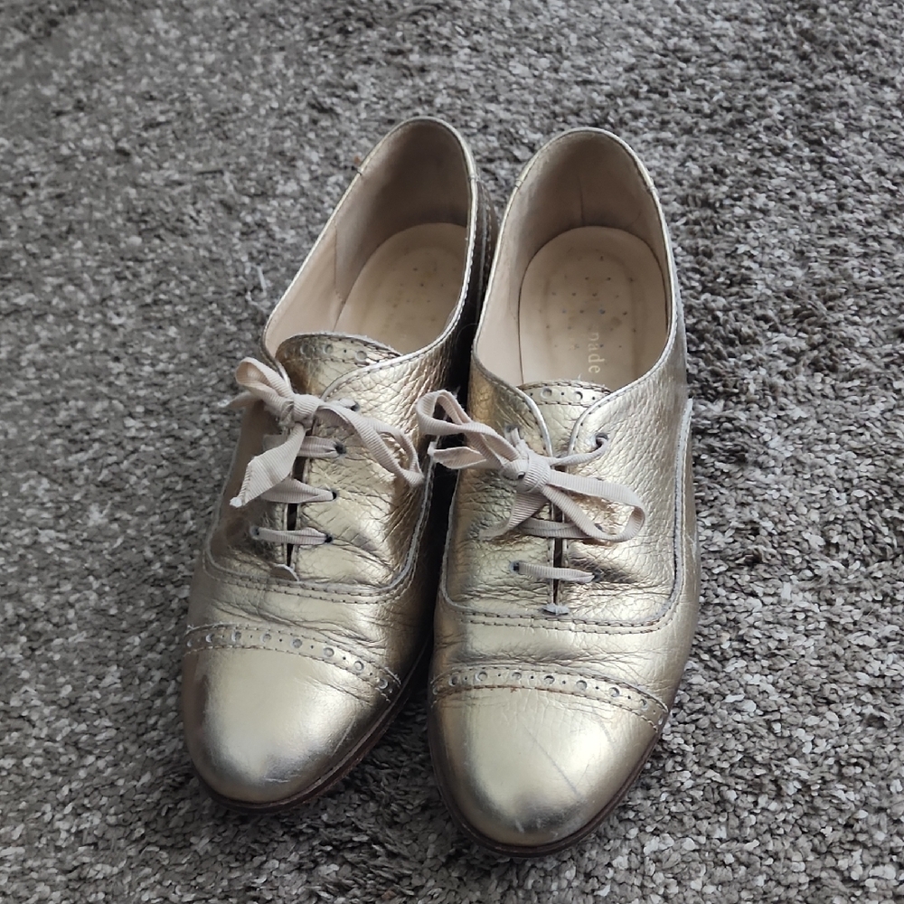 Kate Spade Shimmering Gold Brogue Flats